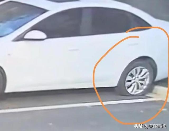 女子汽车后轮胎被丈夫偷偷放气